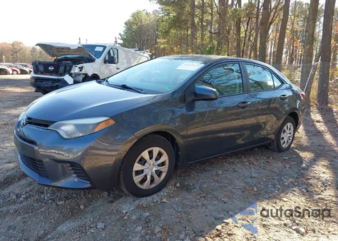 2015 Toyota Corolla Le Eco z USA, uszkodzony, nr VIN 2T1BPRHE2FC394446